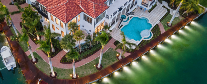 Lido Key home with custom Epi boat dock with a lift in Sarasota.